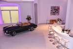 Classic car showroom with organic shapes